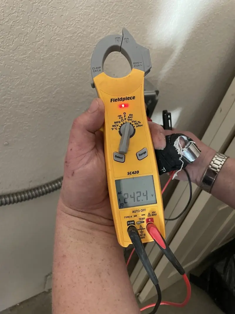 Voltage testing with clamp meter during Generator Installation in Sewanee